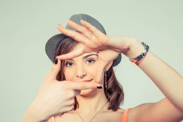 istock Happy woman making frame with fingers 931513492