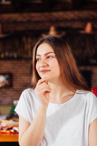 istock Young woman thinking in cafe 931513942