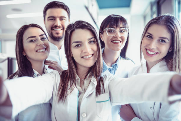 istock Group of Dentists Students Make Selfie in Clinic 931519858