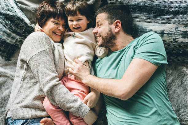 istock Parents with only daughter playing in the morning 931519916