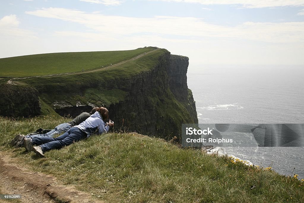 Cliffs of Moher Couple Adventure  Couple - Relationship Stock Photo