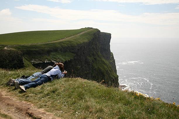 Cliffs of Moher Couple Adventure  county clare stock pictures, royalty-free photos & images