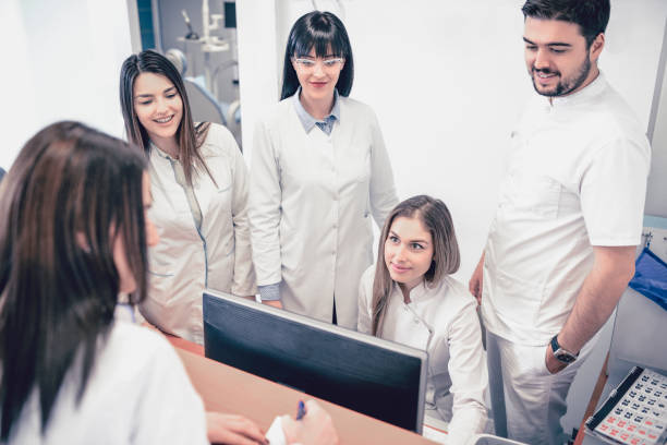 istock Young Medical Team Have Small Meeting at Clinics Reception 931522874