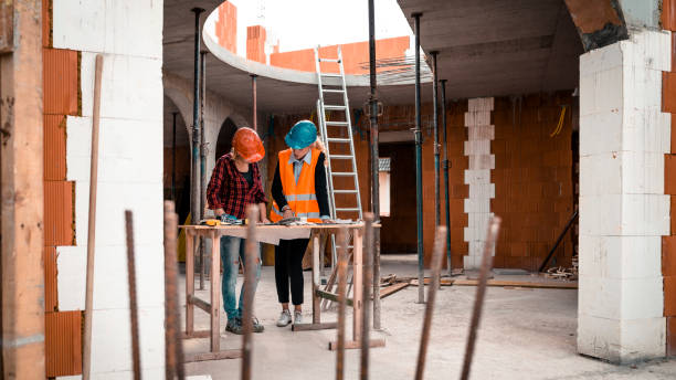 istock A group of people is reviewing plans for construction work 931523992