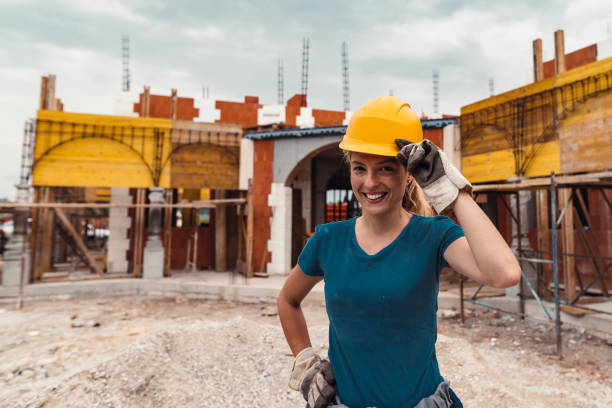 istock Portrait of young manual worker on construction site 931524088