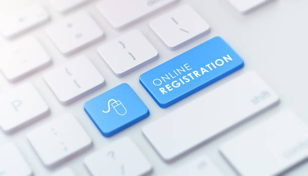 Modern Keyboard with Blue Online Registration Button stock photo