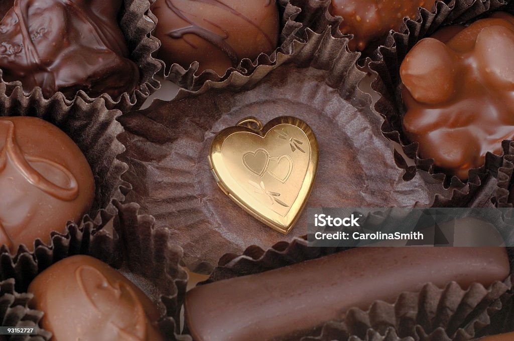 Gold Heart and Chocolates  Chocolate Stock Photo