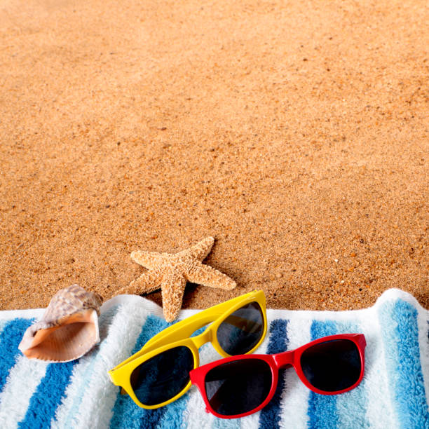 istock Beach background border sunglasses, towel, starfish, seashell square 931530704