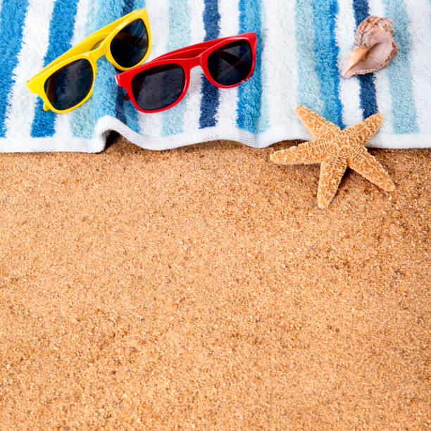 istock Beach background border sunglasses, towel, starfish seashell square format 931531168