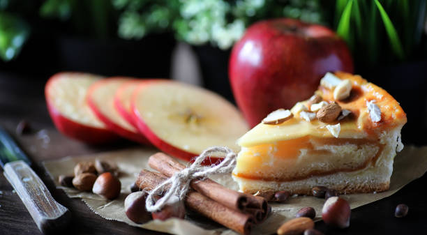 istock Pie with cinnamon and apples on a wooden table. Fresh pastry wit 931531766