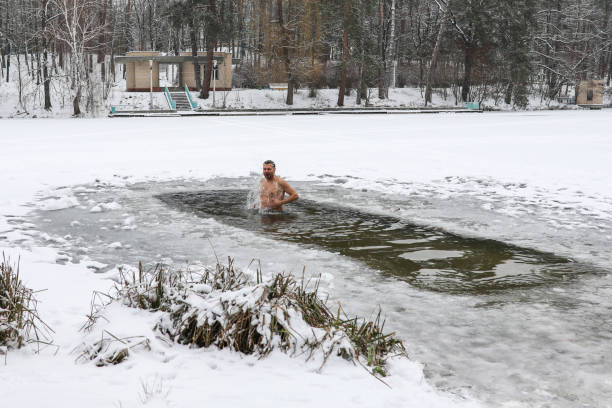istock Bathing in the ice-hole in  Epiphany Day. 931537856