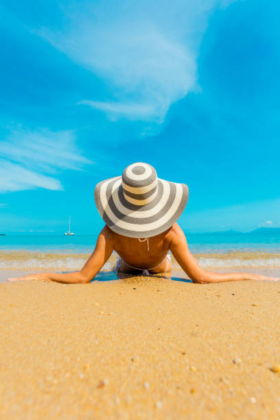 istock Woman at tropical beach 931537902