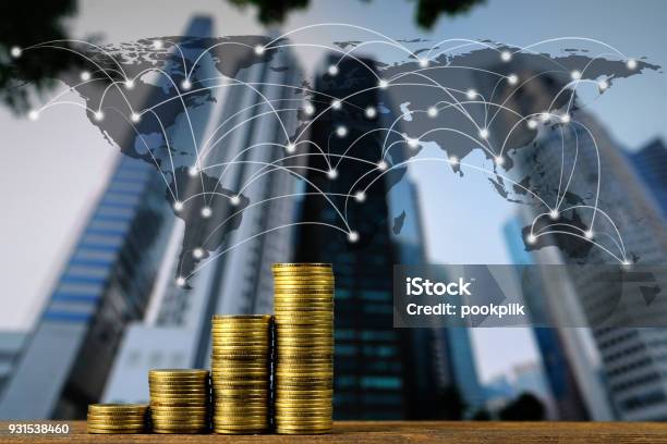 Step Of Coin Stack On Top Wooden Working Table With City Background And World Map Global Network Business Banking Concept Stock Photo - Download Image Now