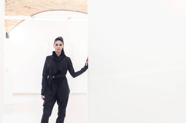 istock fashion model wearing black clothes 931539120