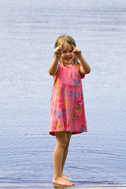 istock young girl pointing with attitude 93154048