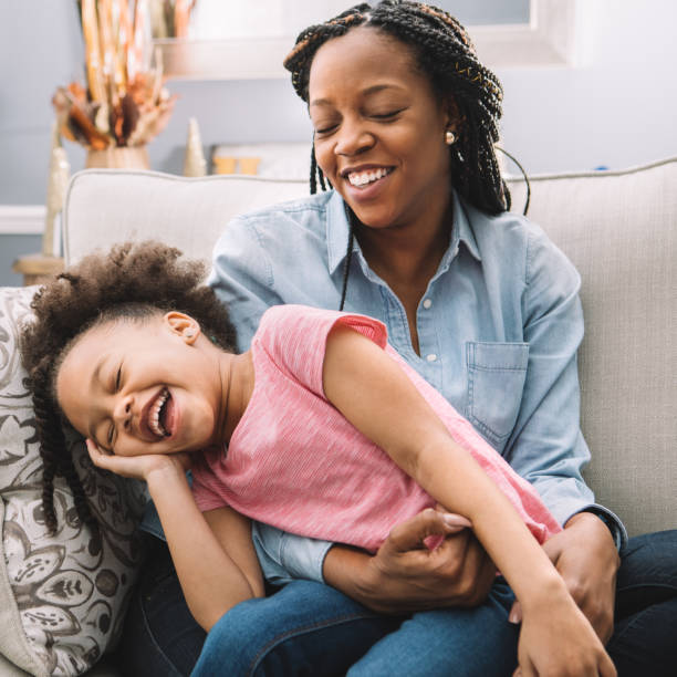 istock family fun on the couch 931542206
