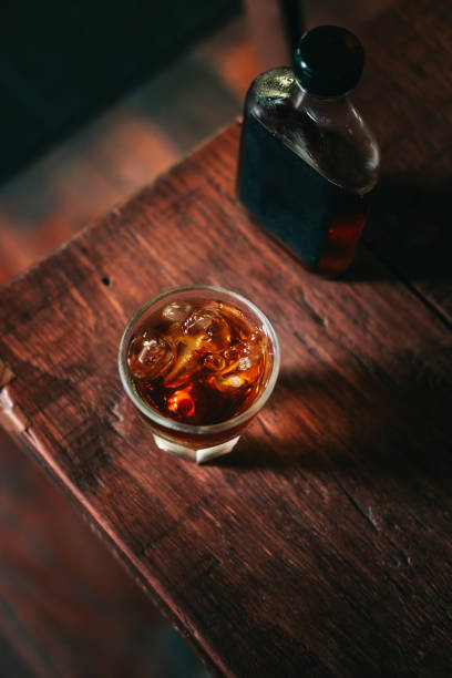istock Cold brew coffee with ice on wooden table 931544104