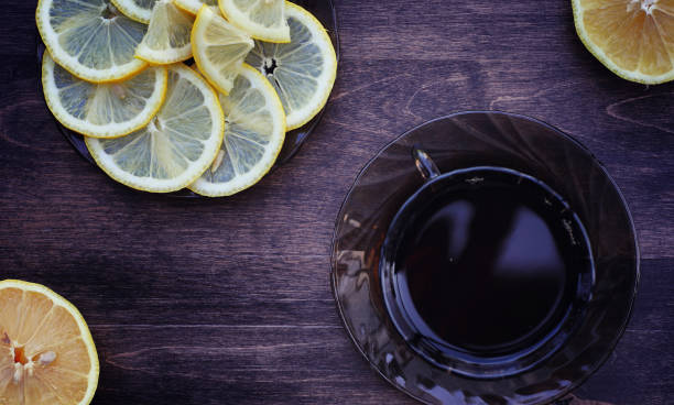 istock Tea with lemon and mint in nature. A cup of hot mint tea with le 931546286