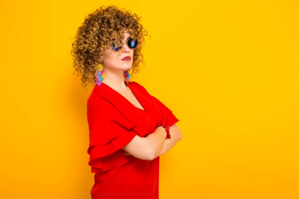 istock Attractive woman with short curly hair 931546792