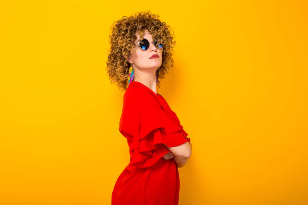 istock Attractive woman with short curly hair 931546794