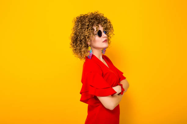 istock Attractive woman with short curly hair 931546822