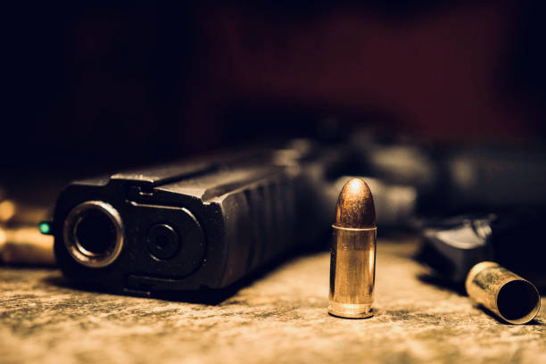 istock a handgun and it's bullet III 931551600