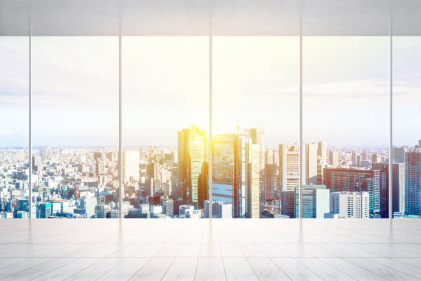 istock empty marble floor and window with panoramic modern cityscape building bird eye aerial view of Shiodome, Tokyo, Japan, for display or mock up 931555282