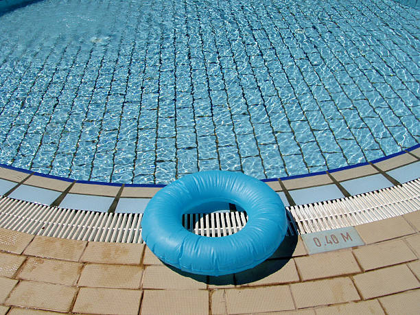 istock Life buoy by the hotel's pool (safety concept) 93155812