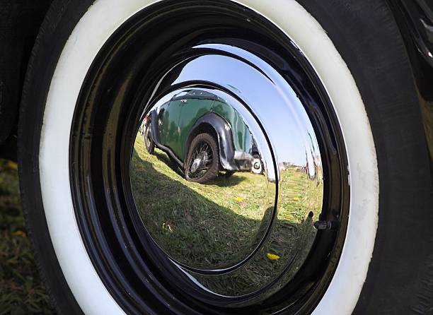 istock Vintage Car Wheel With Chrome Hubcap 93155898
