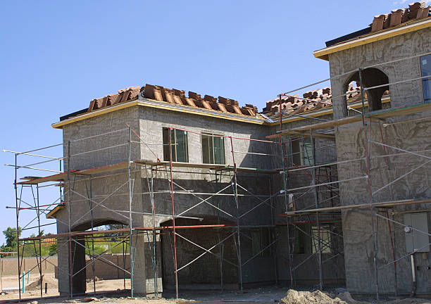 istock 2-story exterior scaffolding and roofing. 93156002
