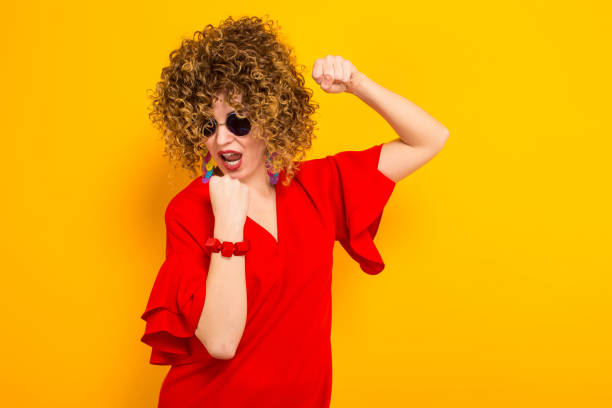 istock Attractive woman with short curly hair 931562482