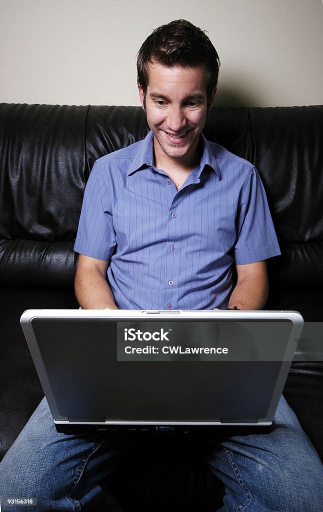 Человек, работающих из дома - Стоковые фото Brand Name Online Messaging Platform роялти-фри