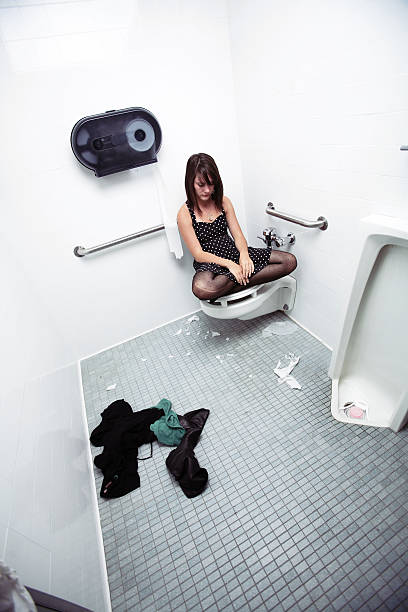 istock Girl with Dress Thinking in a Restroom 93157121