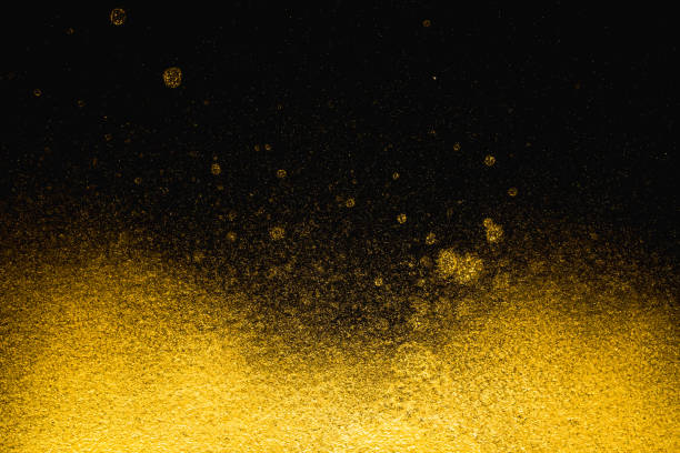 istock Golden abstract grainy texture on black background 931574030