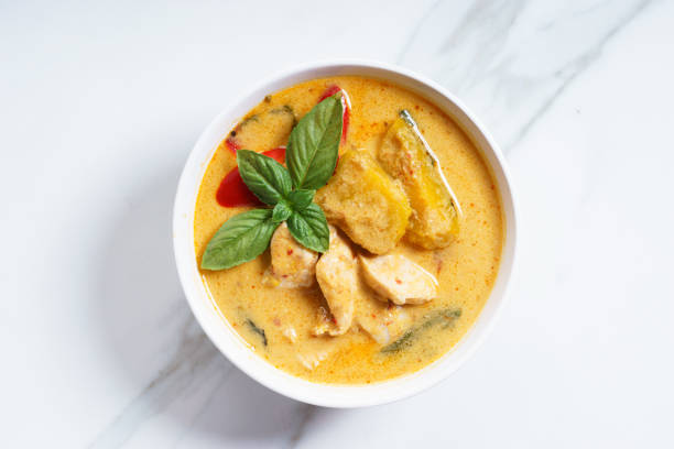 pumpkin curry pumpkin and coconut cream curry with chicken meat, asian recipe curry stock pictures, royalty-free photos & images