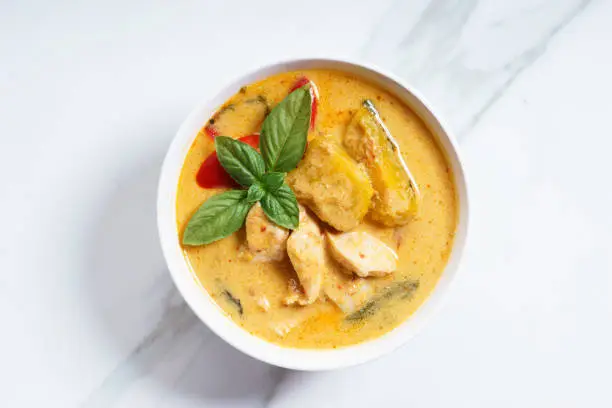 pumpkin and coconut cream curry with chicken meat, asian recipe