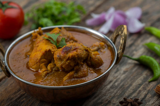 istock indian chicken curry or kadai chicken 931583212