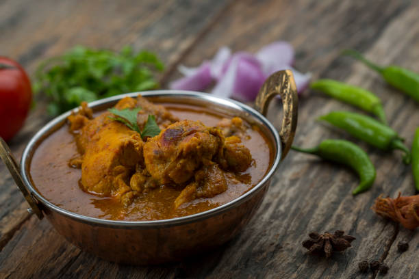 istock indian chicken curry or kadai chicken 931586058