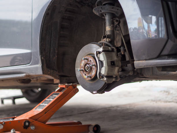 istock Removed car wheel in car brake and wheel maintenance service progress. 931586780