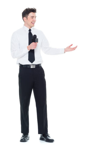 istock Attractive young businessman speaking into a microphone 931592466
