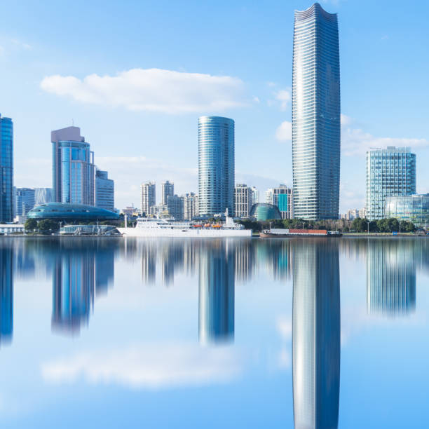 istock modern office block buildings against blue sky 931595466