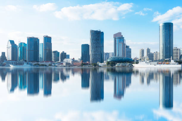 istock modern office block buildings against blue sky 931596094