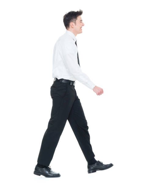 istock Handsome businessman with white shirt walking 931596908