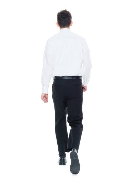 istock Handsome businessman with white shirt walking 931597206