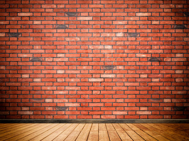 istock Red brick wall and wooden floor background. 931599692