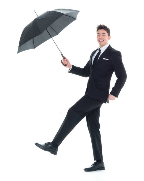 istock Handsome young businessman holding an umbrella 931599900