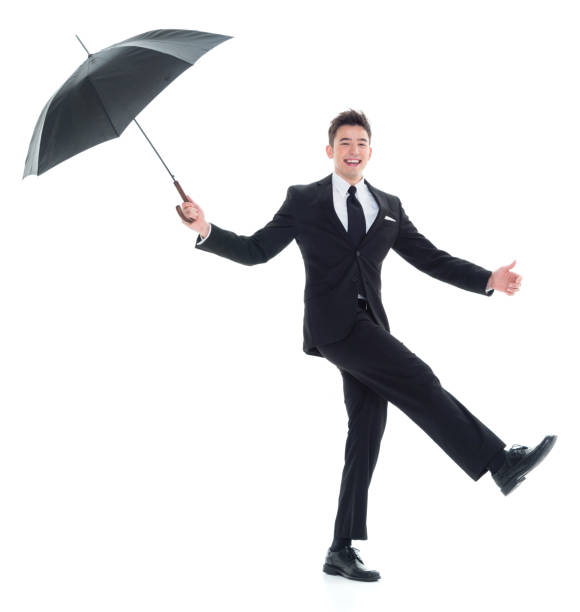 istock Handsome young businessman holding an umbrella 931599914