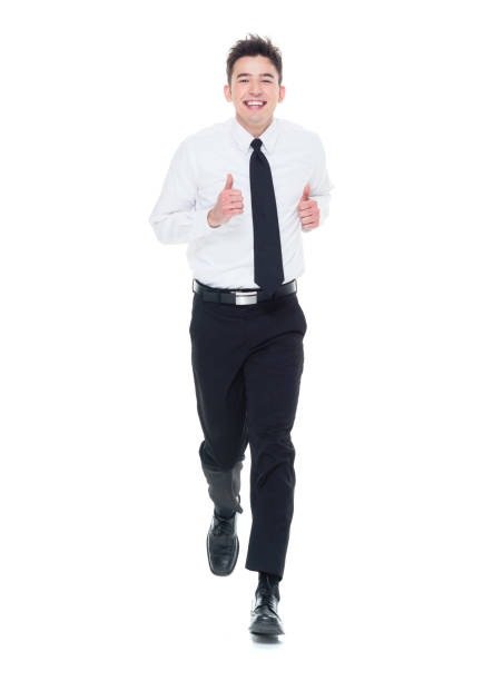 istock Handsome businessman with white shirt running 931599916