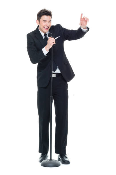 good looking businessman speaking into a microphone - 13427 imagens e fotografias de stock