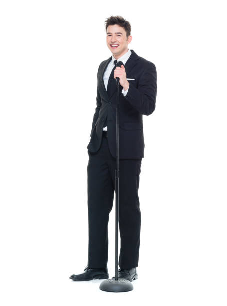 good looking businessman speaking into a microphone - 13431 imagens e fotografias de stock